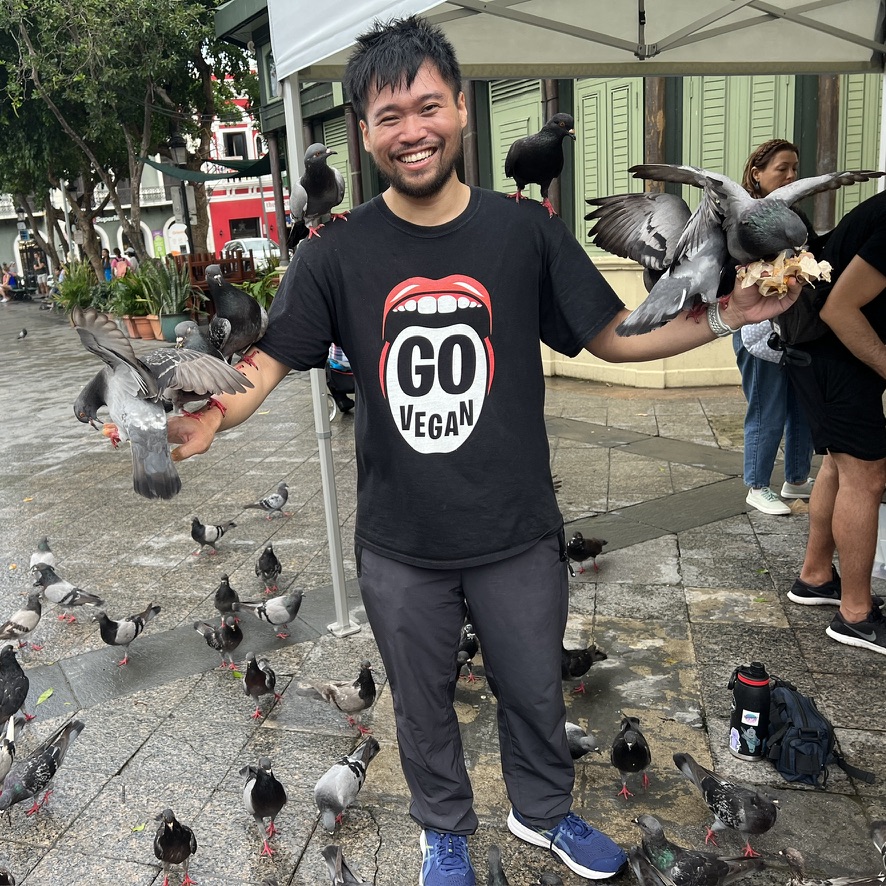 Megg Gawat holding Go Vegan sign